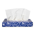 White facial tissues in blue and white flower patterned box