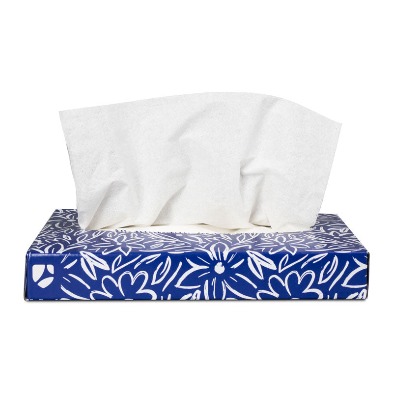 White facial tissues in blue and white flower patterned box